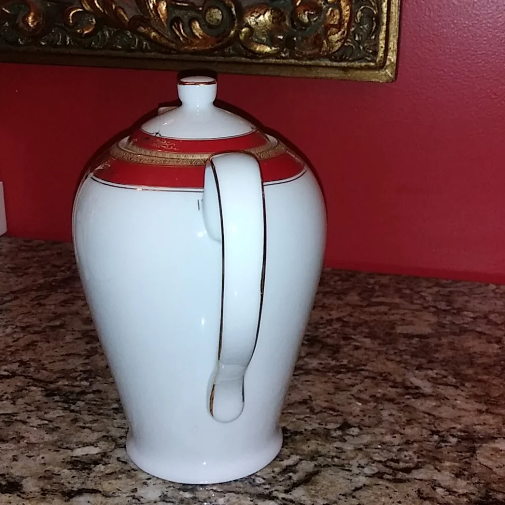 Elegant White Porcelain Teapot with Red and Gold Trim